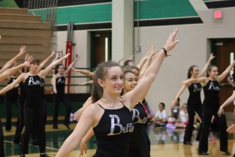 Peyton Faltys (12) dances with the Belles, showing their latest routine.