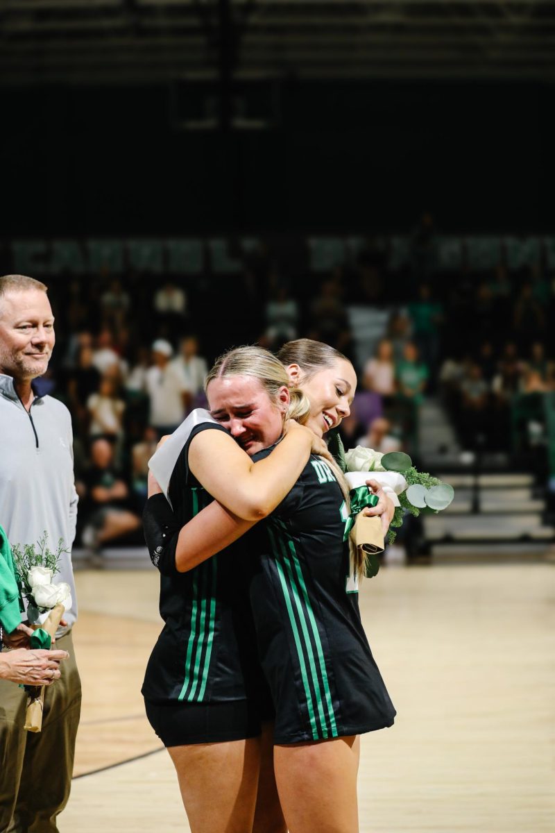 Senior Kinsley Young; The varsity Lady Dragons volleyball team (27-5) defeated the LD Bell Raiders (7-19) on Oct. 21, three sets to none.